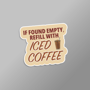 Sticker with text 'If found empty, refill with iced coffee' on a gray background