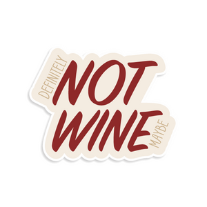 Sticker with 'Not Wine' text in red on a beige background