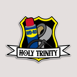 A toolbox sticker featuring a humorous emblem with a shield, a WD-40 can, cable tie, duct tape and the text 'HOLY TRINITY'.