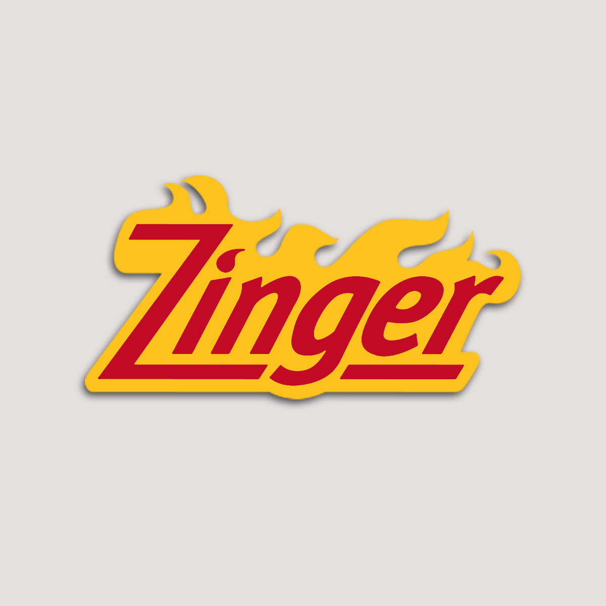 A sticker with the word 'Zinger' written in a stylized font, with a yellow background and a red flame design.