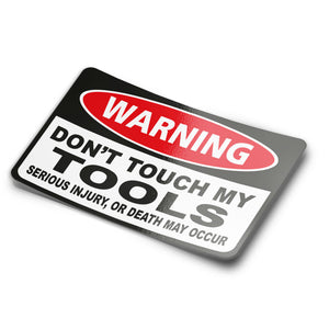 A sticker with a black and red warning label design that says 'WARNING DON'T TOUCH MY TOOLS SERIOUS INJURY OR DEATH MAY OCCUR'.