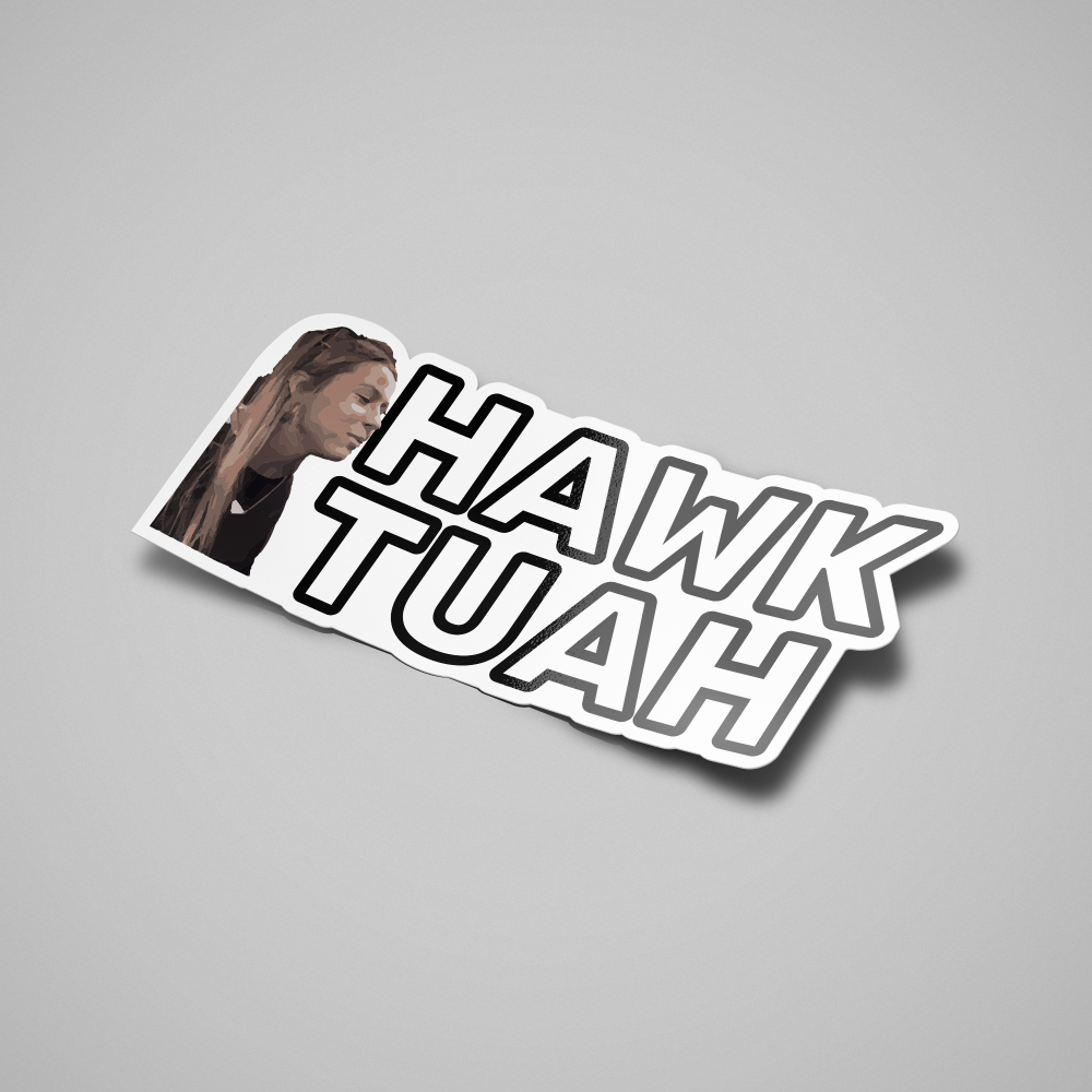 A sticker with the text 'HAWK TUAH' in bold, black letters with a photo of the lady from the meme in the background.