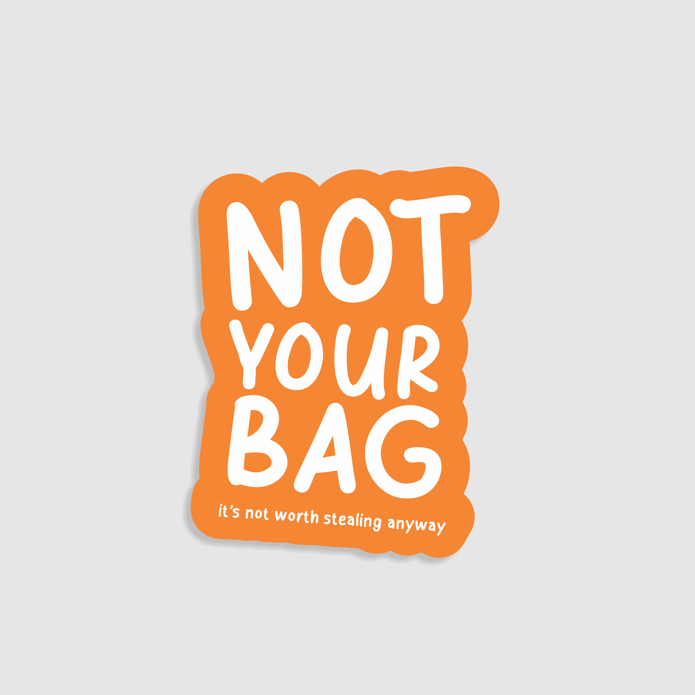 Sticker with 'Not Your Bag' text on a orange background. Designed to go on suitcases.