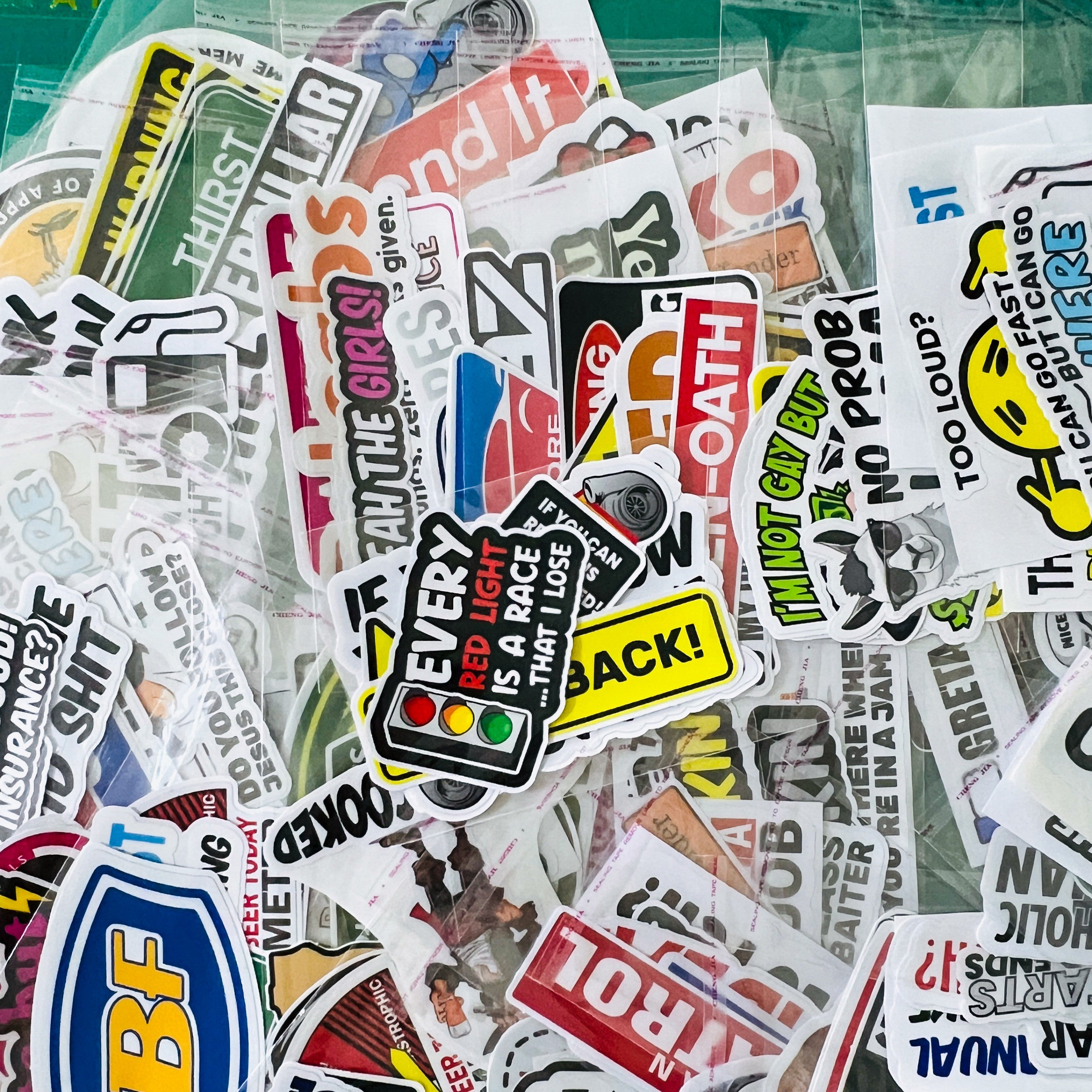 Collection of various stickers with different designs showing some of the packs that might be sent in the mystery seconds.