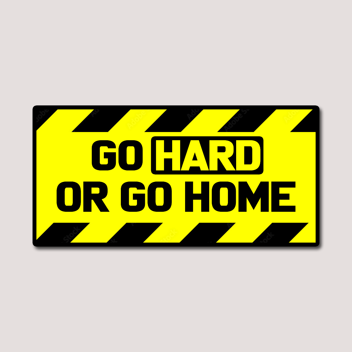 A sticker with a black and yellow warning tape design containing the text 'GO HARD OR GO HOME'.
