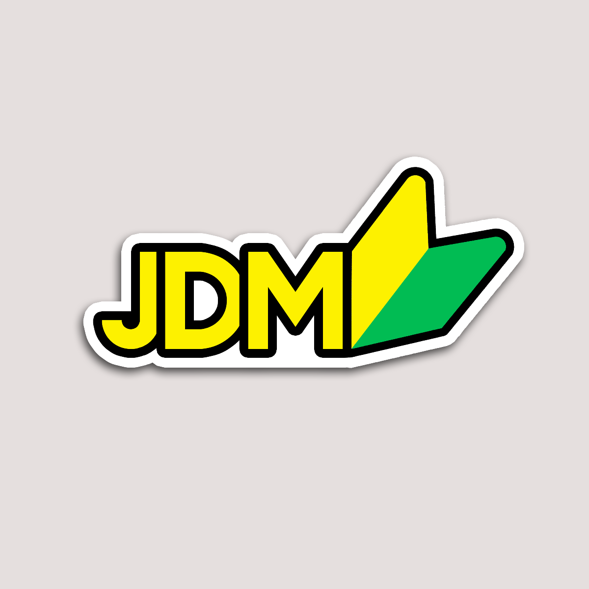 A sticker with a green and yellow design featuring the letters 'JDM' in a bold font.
