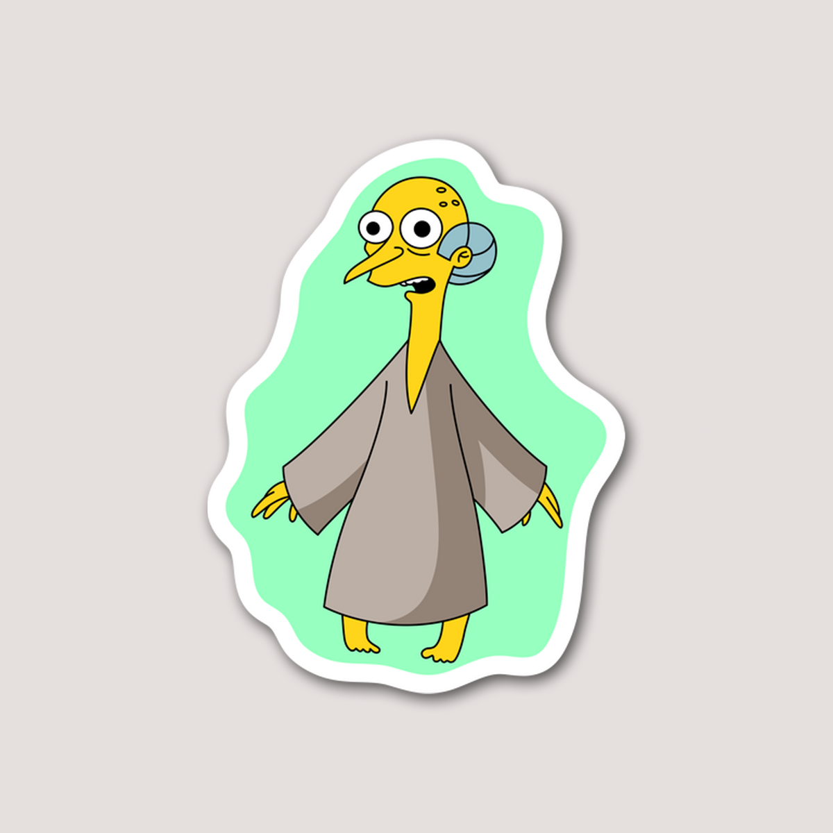A sticker depicting a cartoon version of Mr. Burns from 'The Simpsons' wearing a robe and glowing green. From the X-Files Halloween special.