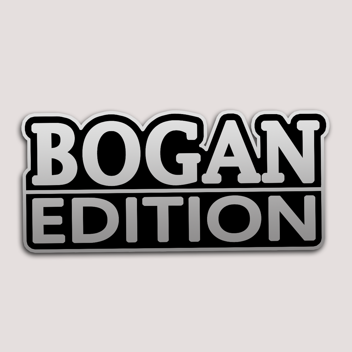 A sticker with the text 'BOGAN EDITION' in bold, black uppercase letters on a white background.
