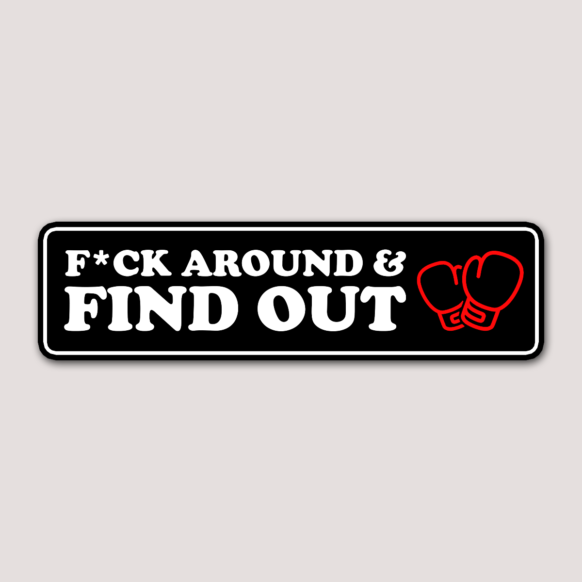 A sticker with a black background featuring white text that reads 'F*CK AROUND & FIND OUT' with a red graphic of boxing gloves on the right side.