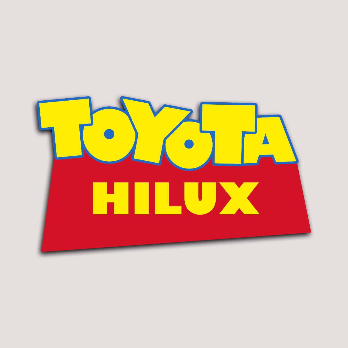 A sticker with the text 'TOYOTA HILUX' in yellow and red on a white background.