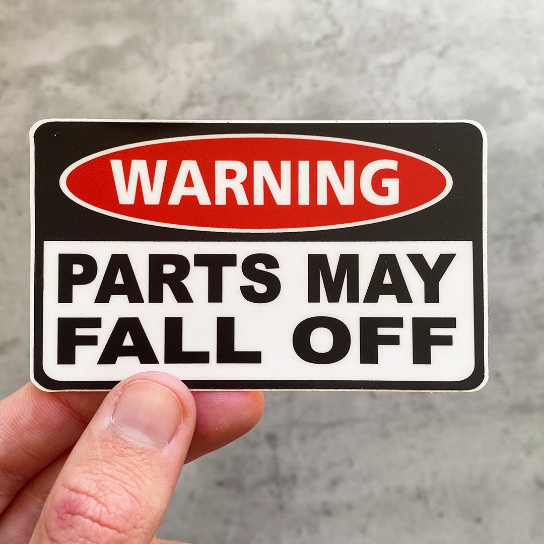 WARNING PARTS MAY FALL OFF STICKER