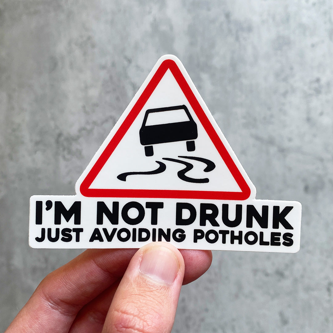 AVOIDING POTHOLES STICKER