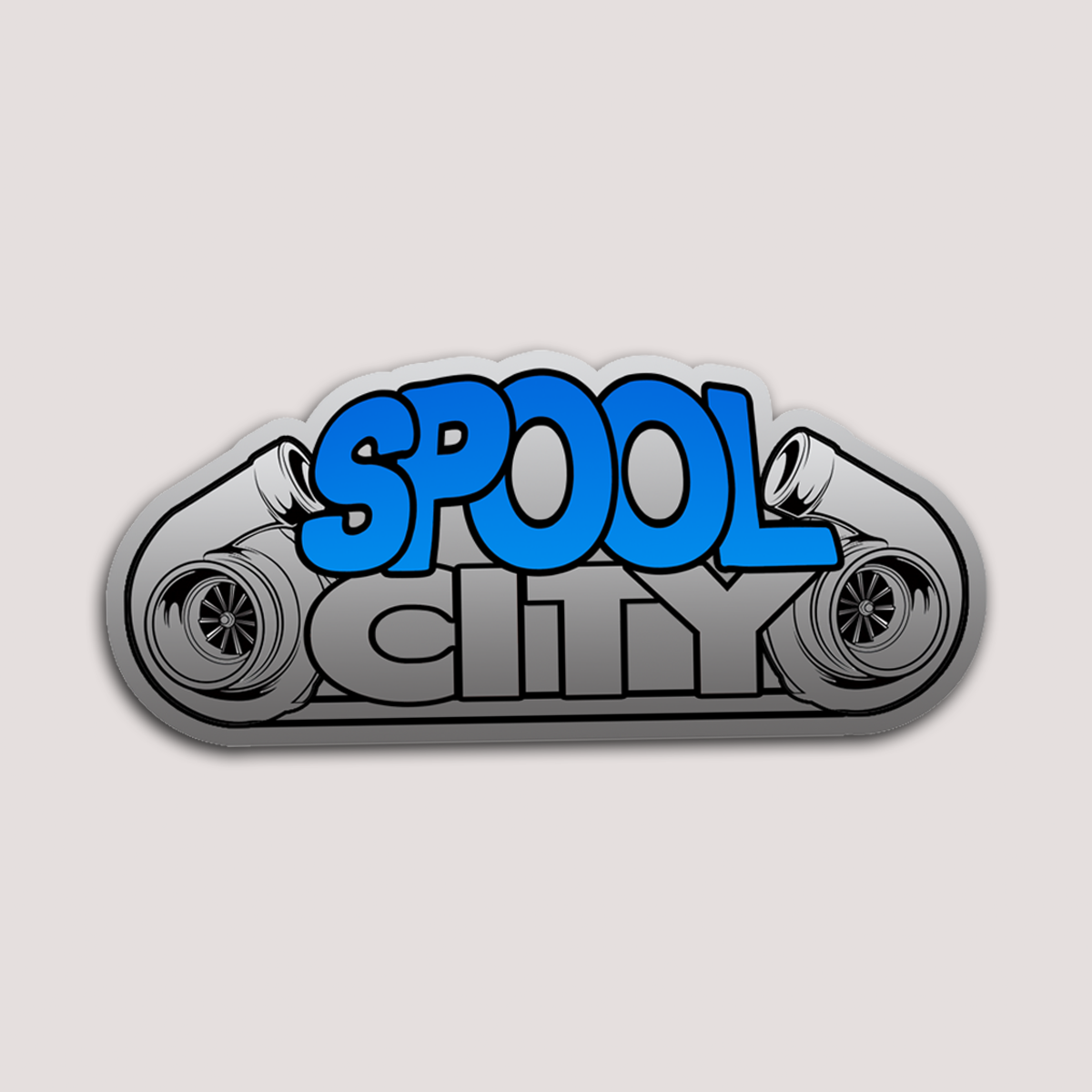 A sticker with 'SPOOL CITY' text designed with a graphic of a car turbo on either side in blue and gray colours on a white background.